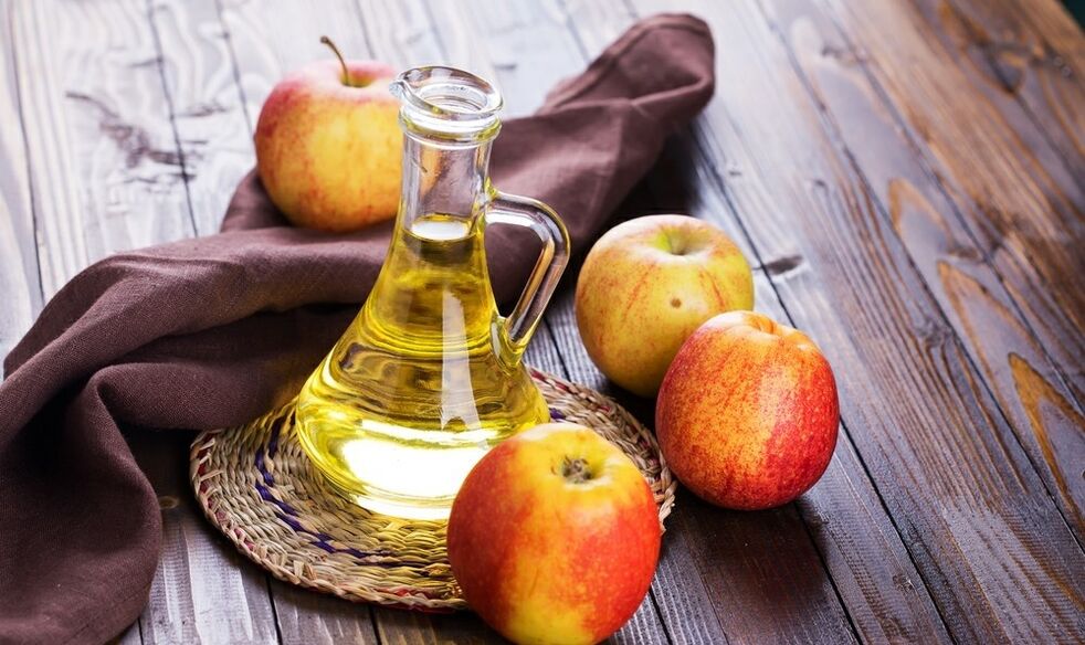 apples and apple cider vinegar on slimming table