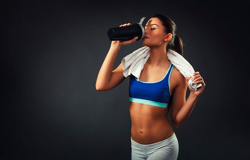 Fit Woman Uses Fat Burning Drink