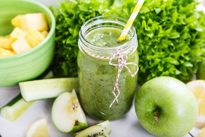 Hearty Detox Smoothie for Breakfast with Banana, Apple, Spinach, Walnuts and Flax Seeds